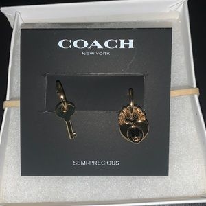 Brand new Coach earrings
